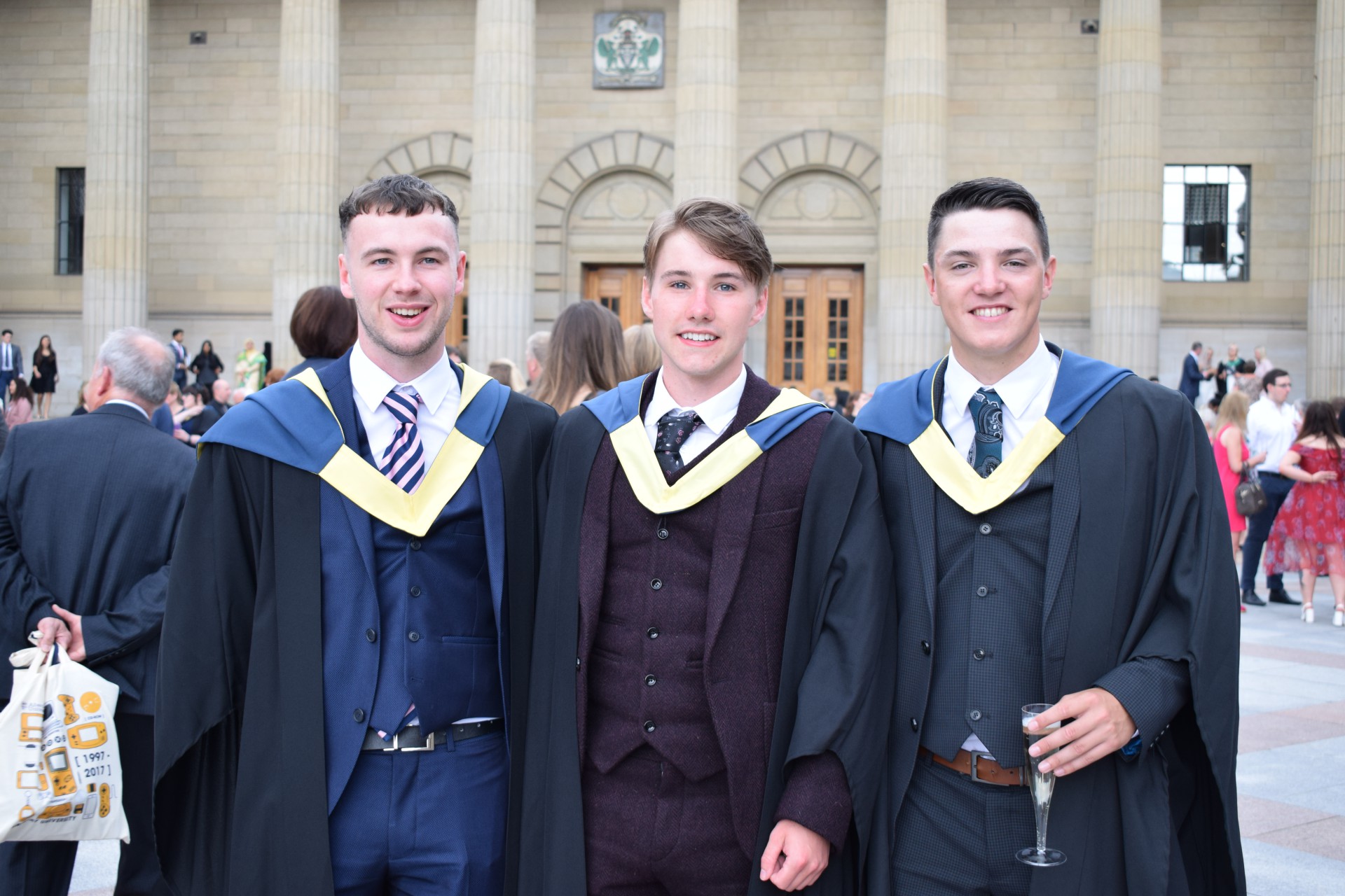 Three male graduates
