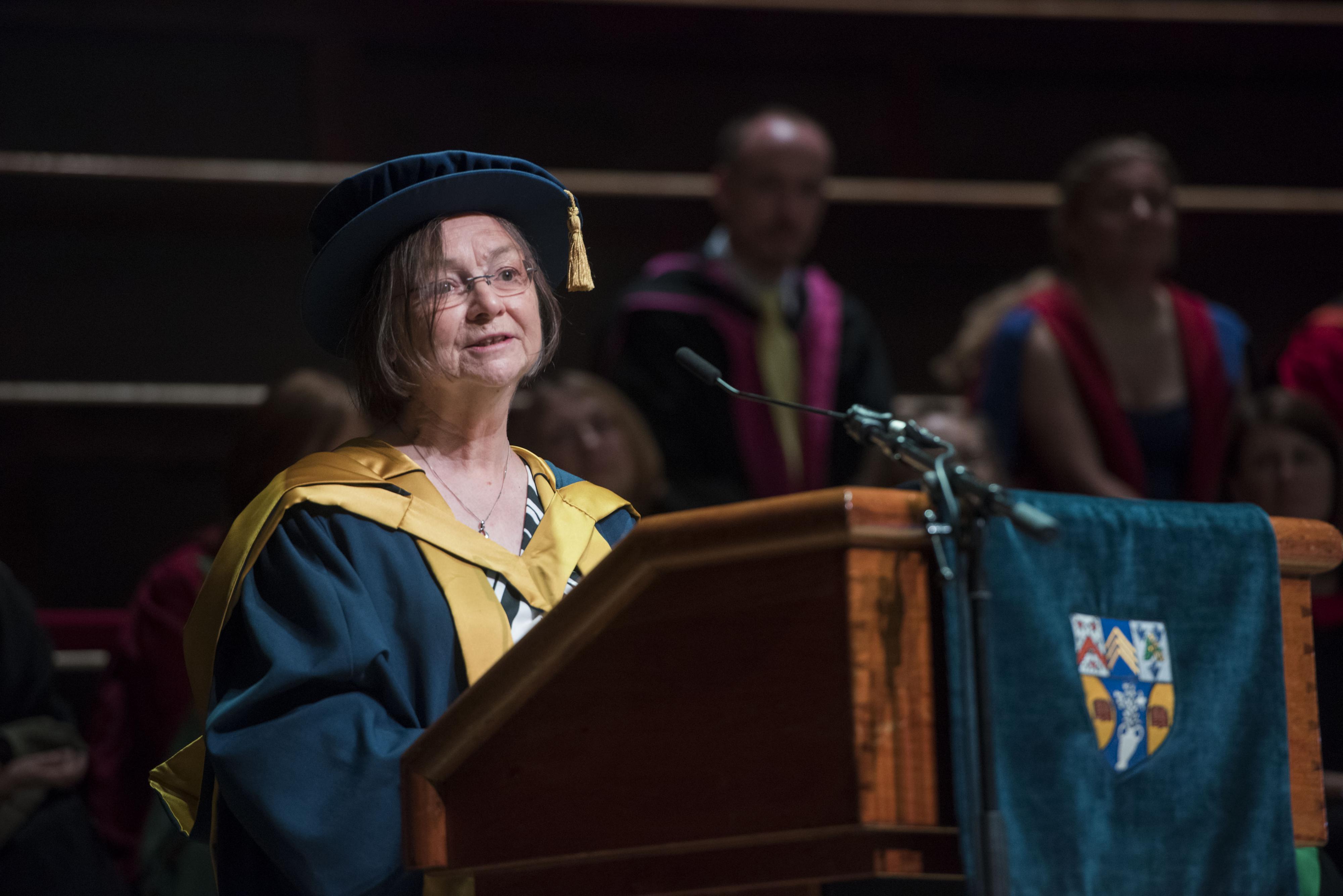 A picture of Dr Jean Venables giving her graduation speech.