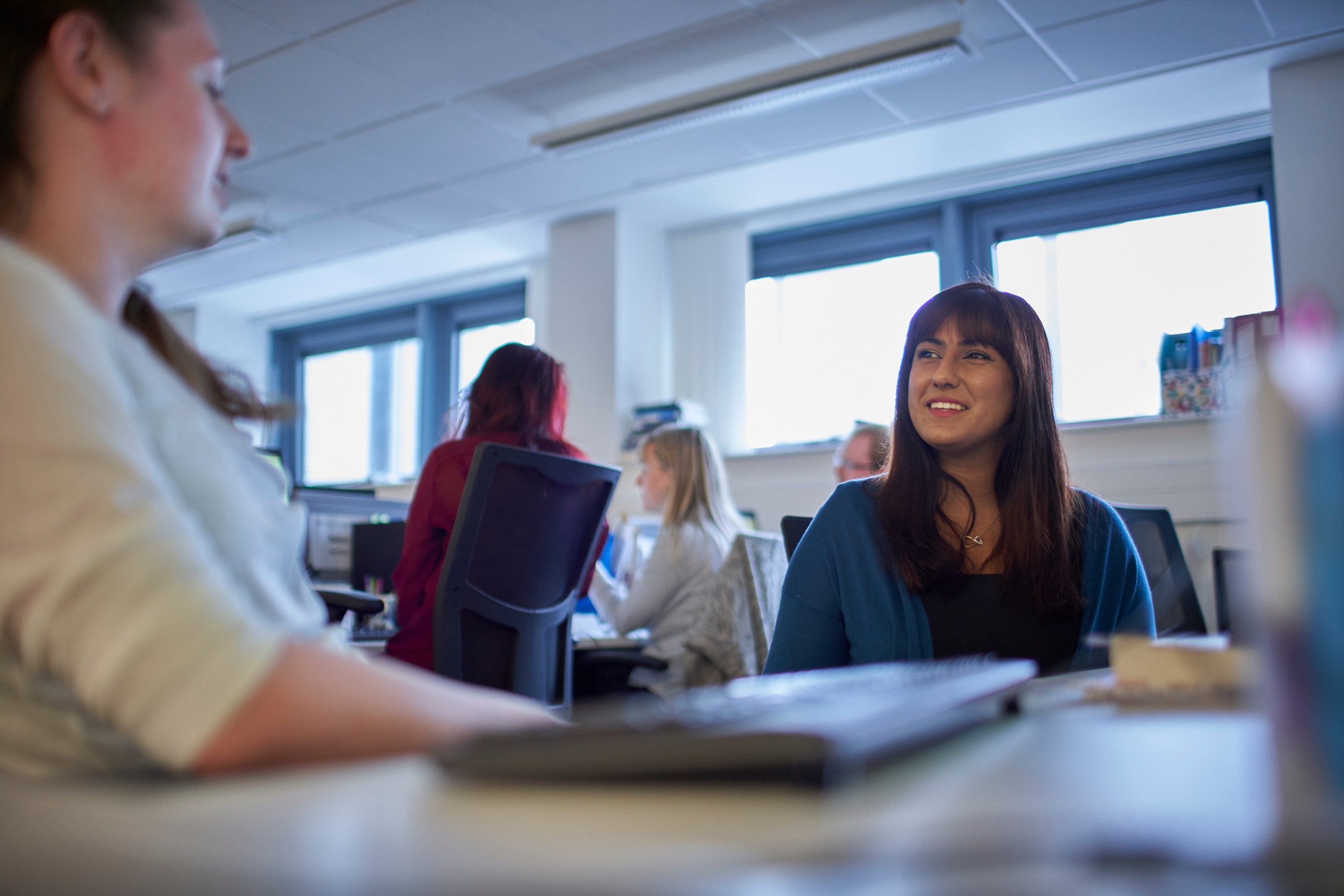 Students discussing work at Abertay