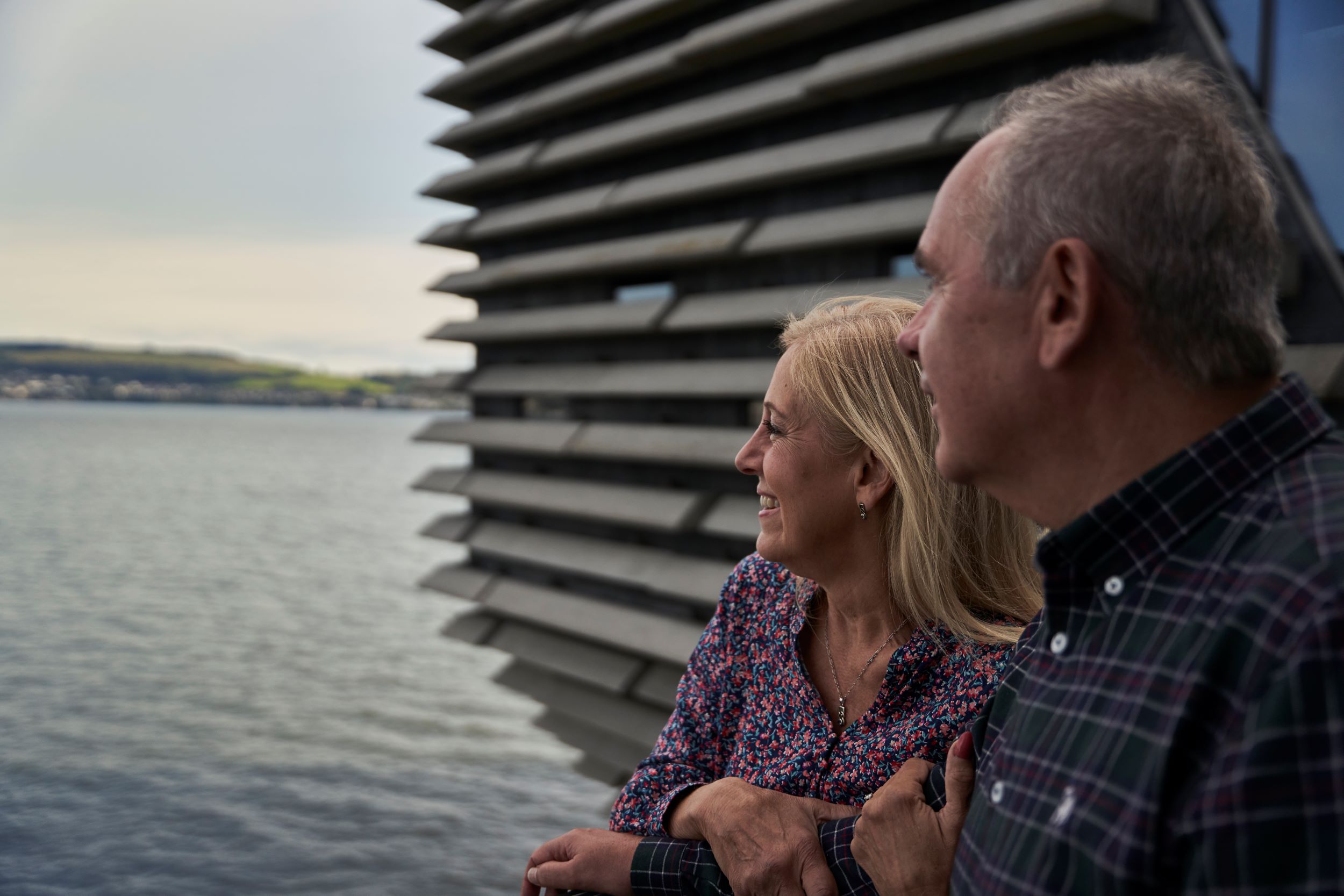 Couple on balcony of V&A Museum Dundee