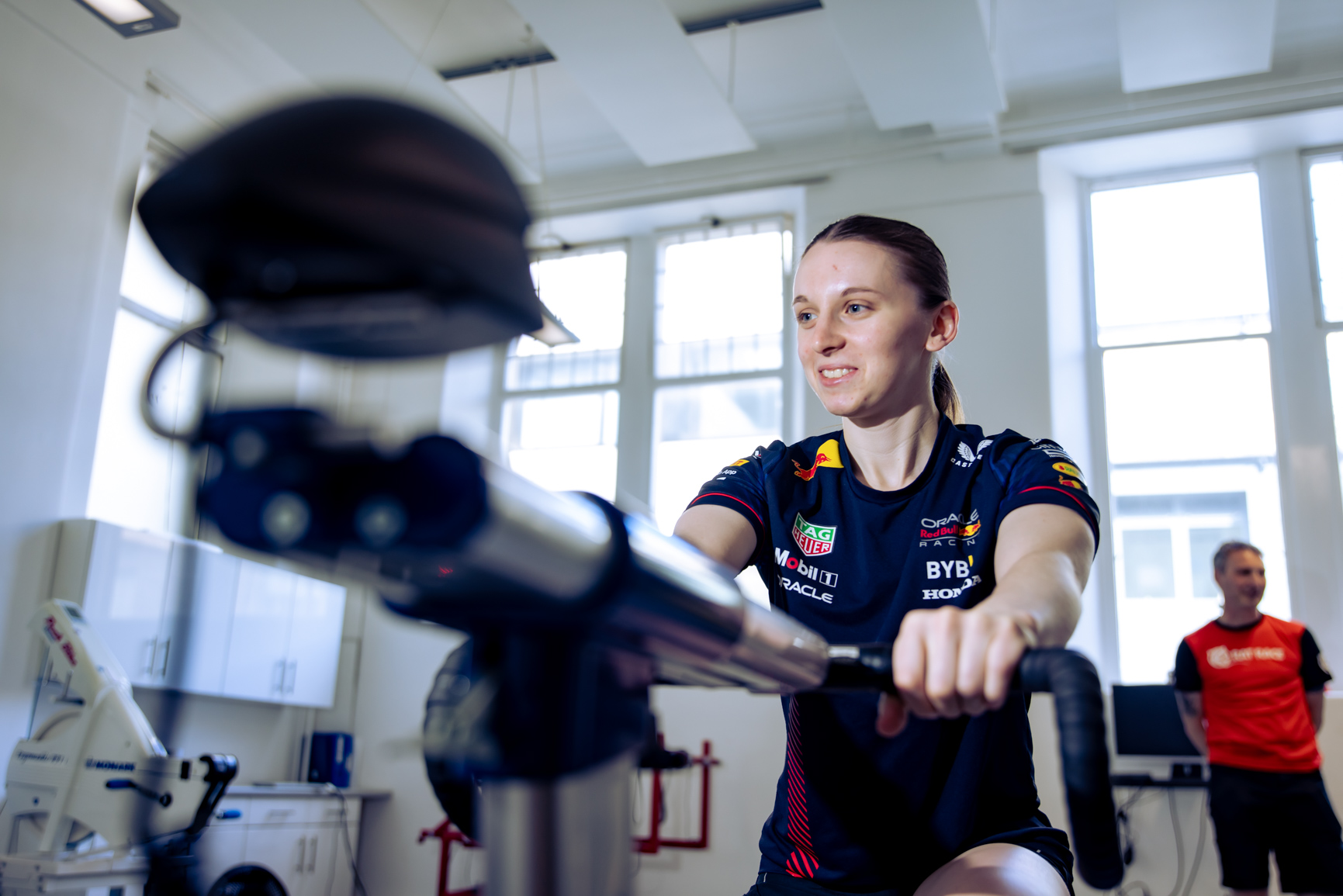 Kanzen Karate's Cerys Hawes smiles as she trains on a bike in the Abertay University sports labs