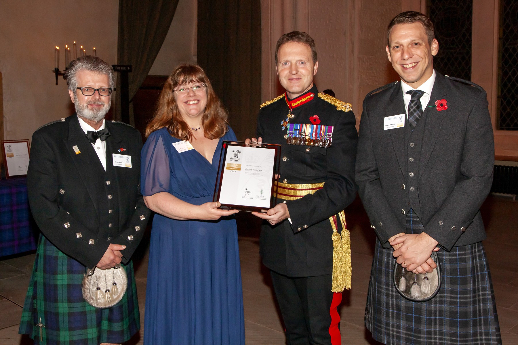 Abertay staff members receive the award